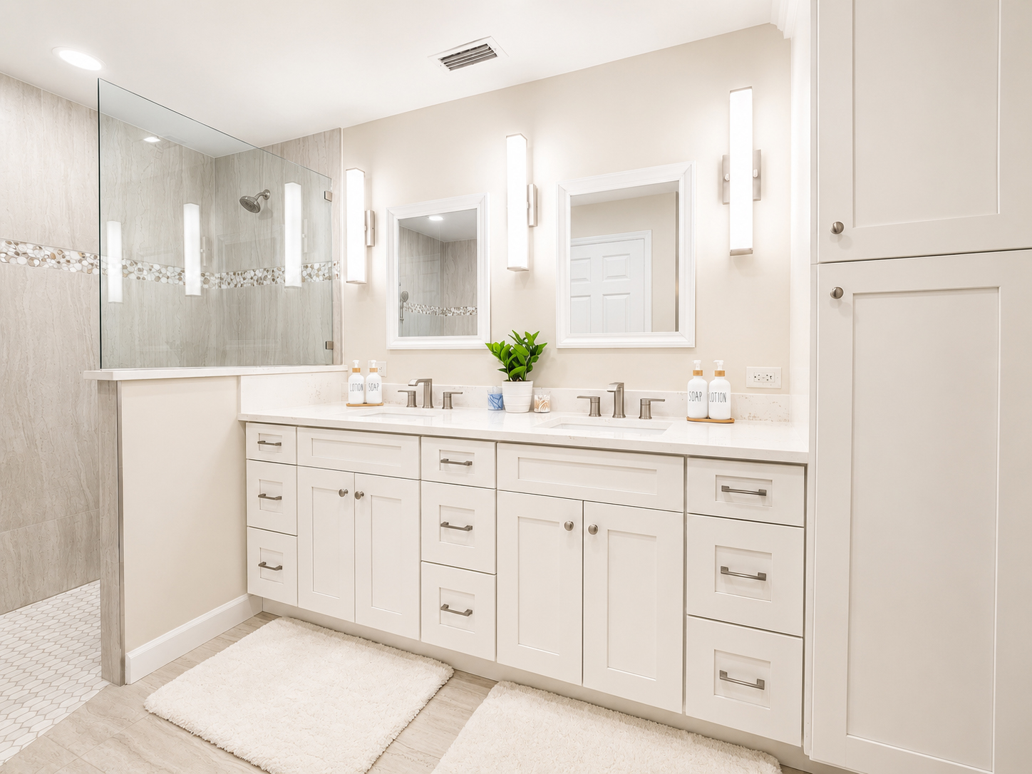 Primary bathroom with double vanity and walk-in shower